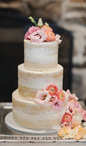 The three-tiered barely naked cake by The Master’s Baker included cream cheese buttercream and apricot jam. Photographed by Asya Photography