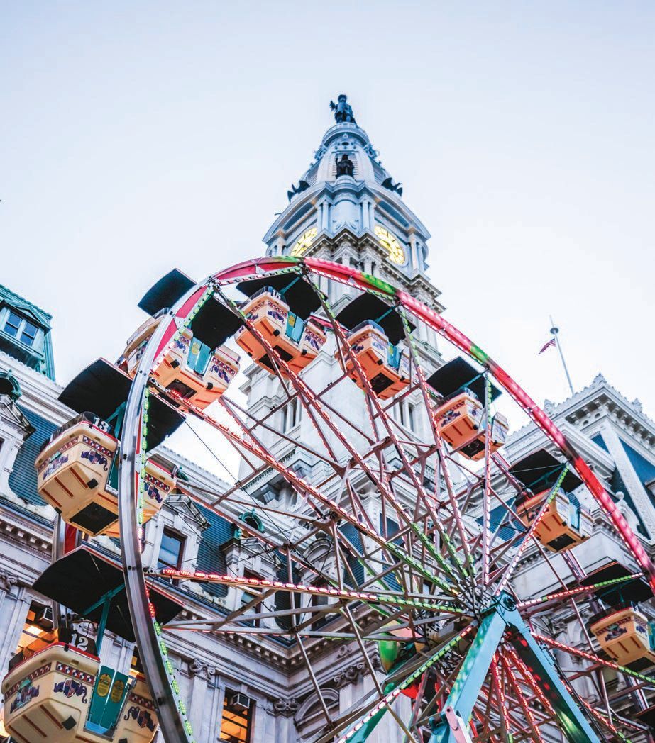 Take in the city’s holiday decor from the top of Christmas Village’s ferris wheel. PHOTO COURTESY OF BRAND