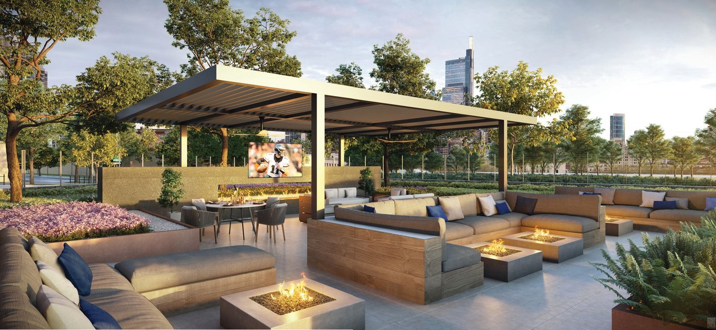 The outdoor oasis at 2100 Hamilton is perfect for outside entertaining thanks to flat-screen TVs and fire pits. PHOTO COURTESY OF 2100 HAMILTON