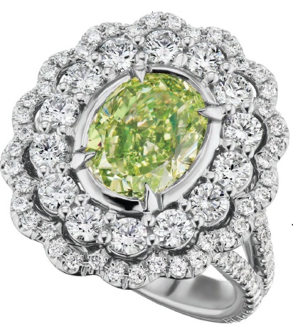 Green-yellow oval diamond set in platinum and accented by white diamonds, available at Bernie Robbins Jewelers PHOTO COURTESY OF BERNIE ROBBINS JEWELERS