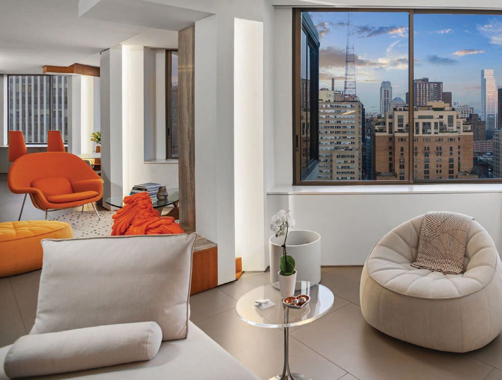 Walls of windows are illuminated by natural light and give unparalleled views of Rittenhouse PHOTO BY OM MEDIA