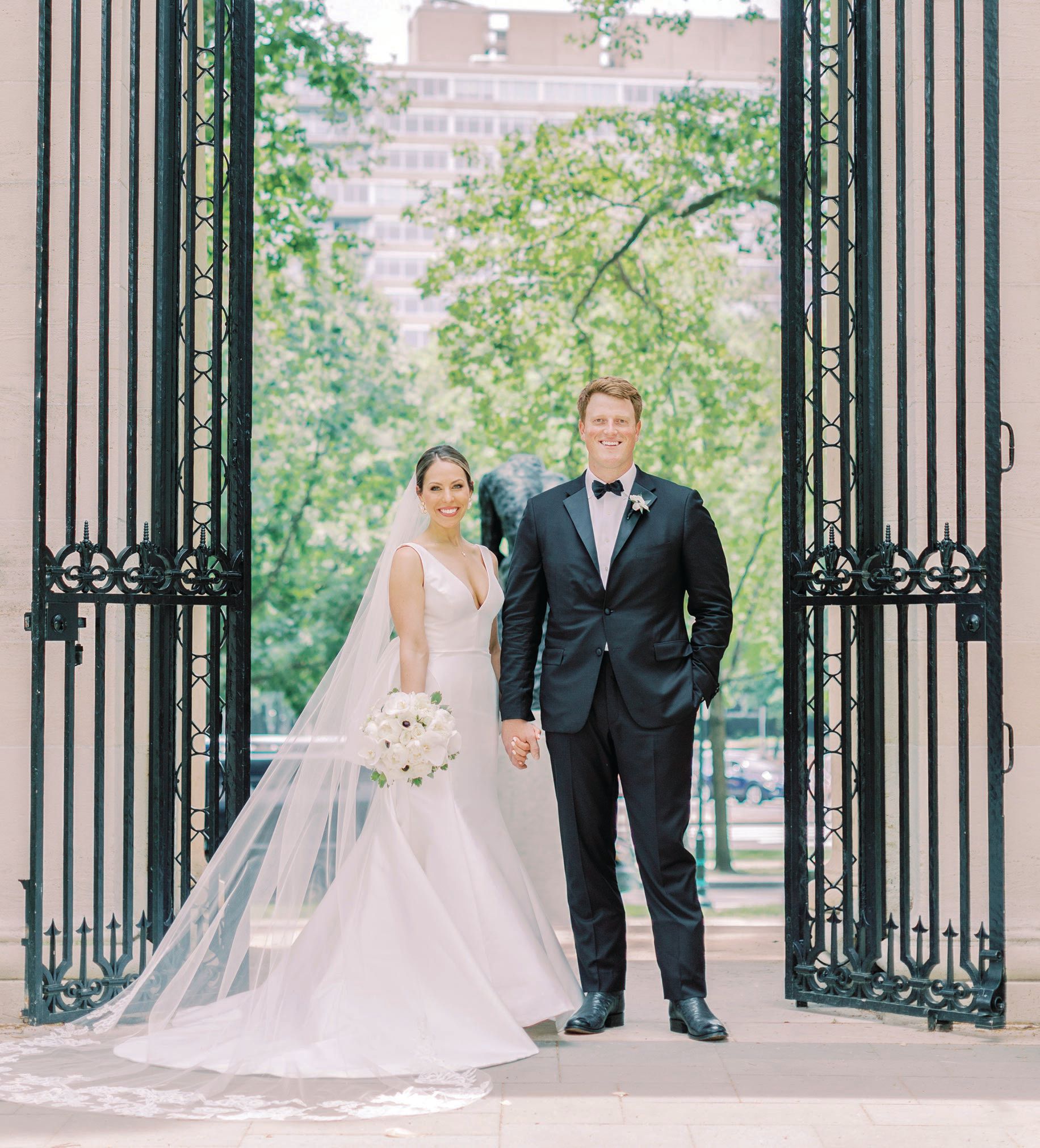 Hillary in a Carolina Herrera gown and Cyrus in Homer Reed. Photographed by Grace Ardor Photography