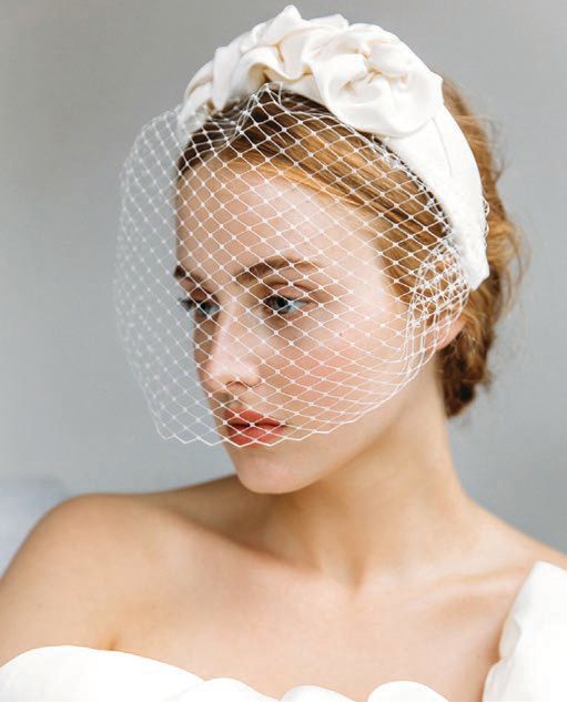 Jennifer Behr triple rosette headband with veil in cream. PHOTO COURTESY OF BRAND